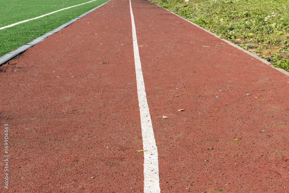 treadmill with a coating of red, terracotta color