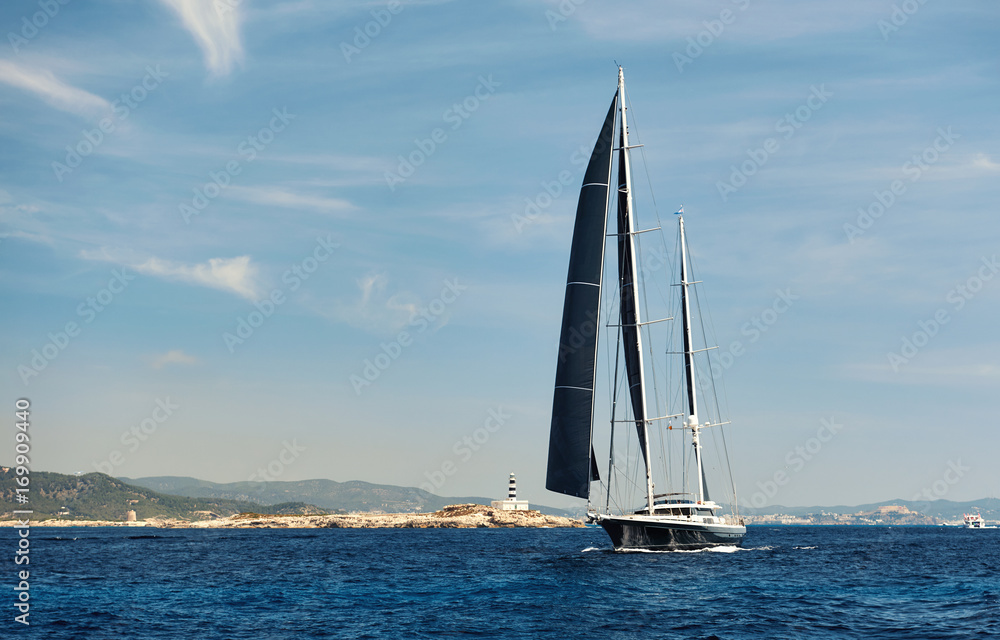 Two-masted yacht in the Mediterranean sea. Ibiza. Spain Two-masted yacht in the Mediterranean sea. Ibiza. Spain