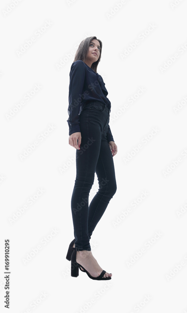 View from below young business woman standing. View from below young business woman standing.