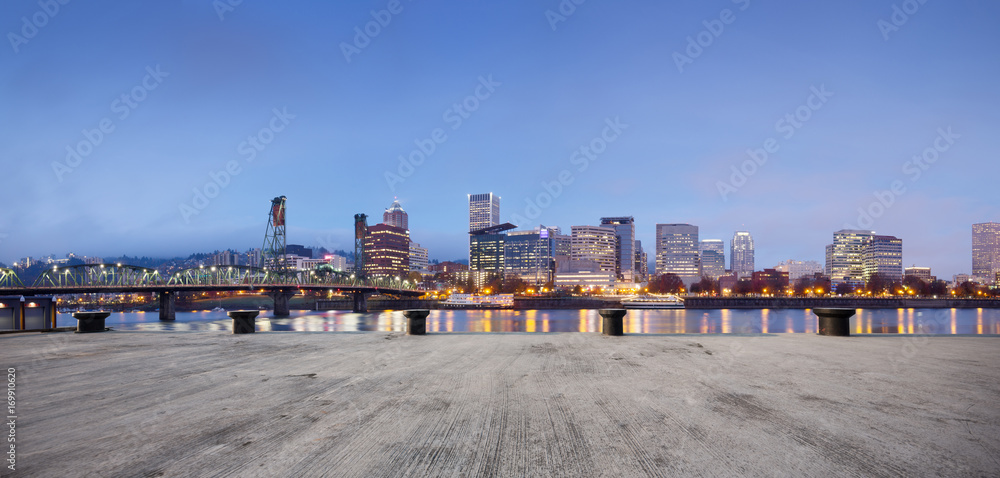 empty concrete floor with cityscape of modern city