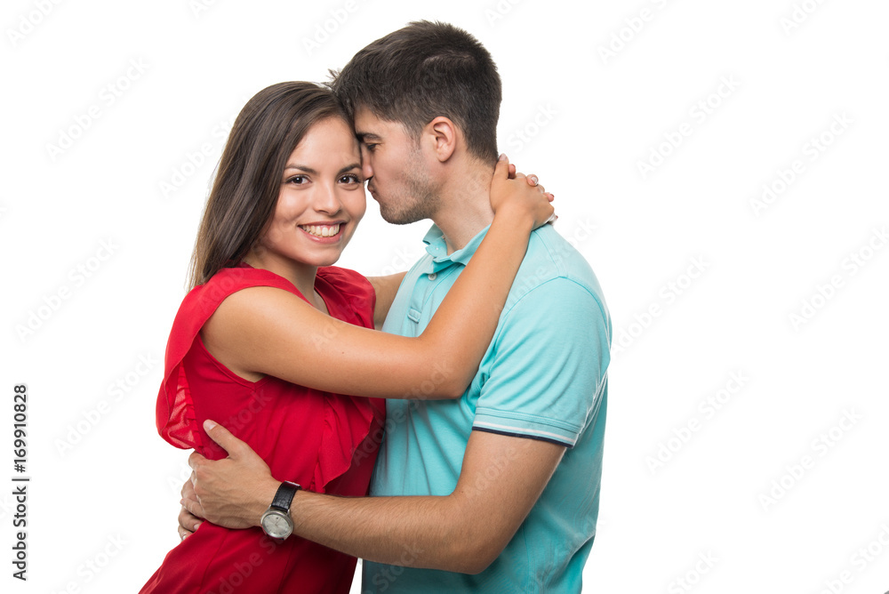 Attractive young couple hugging looking happy Attractive young couple hugging looking happy
