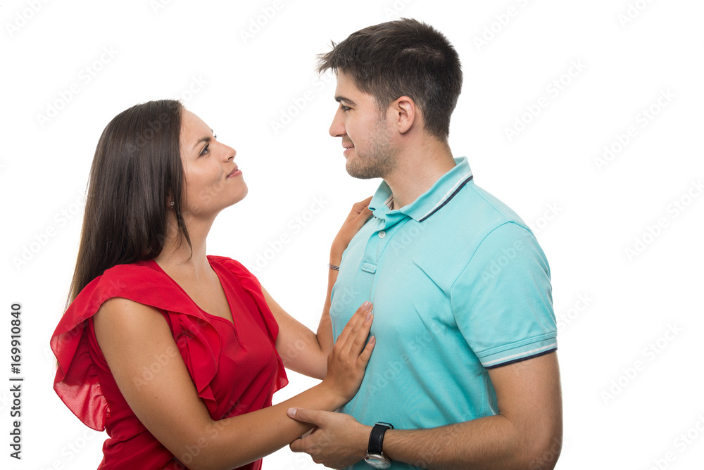 Handsome young couple looking at each other Handsome young couple looking at each other