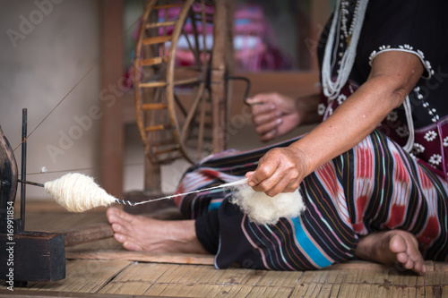 women weaving traditional cotton woven