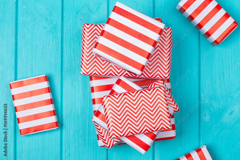 Fototapeta premium Many gifts in a red and white wrapper
