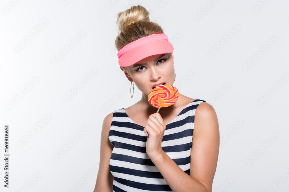 attractive young woman eating lollipop attractive young woman eating lollipop