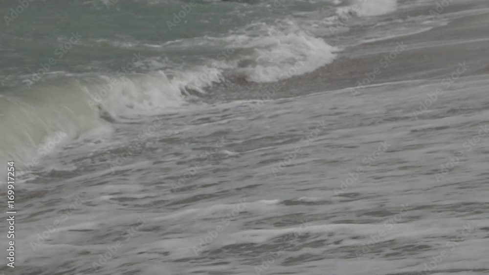 The sea foam in the sand, waves The sea foam in the sand, waves
