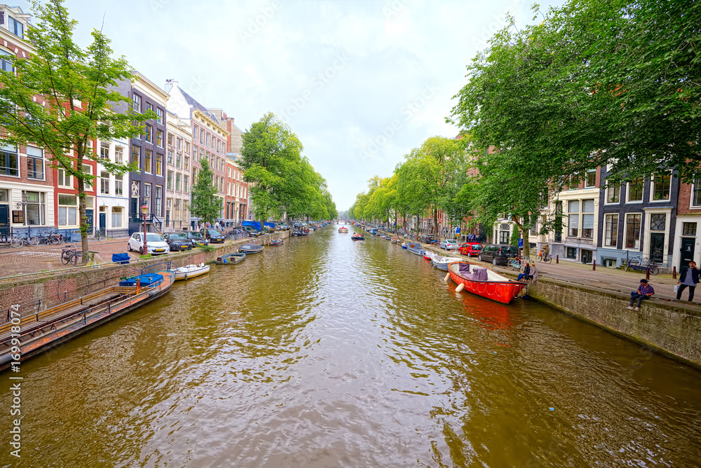 View of Canals, Houses and Boats in Amsterdam