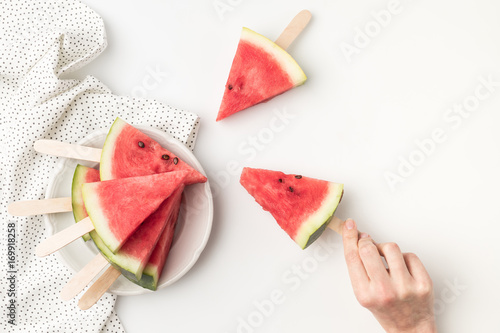 watermelon slices on sticks photo