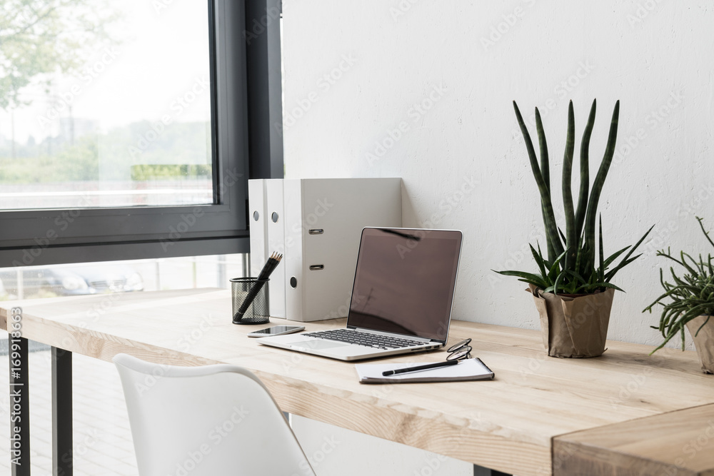 Fototapeta premium workplace with laptop computer
