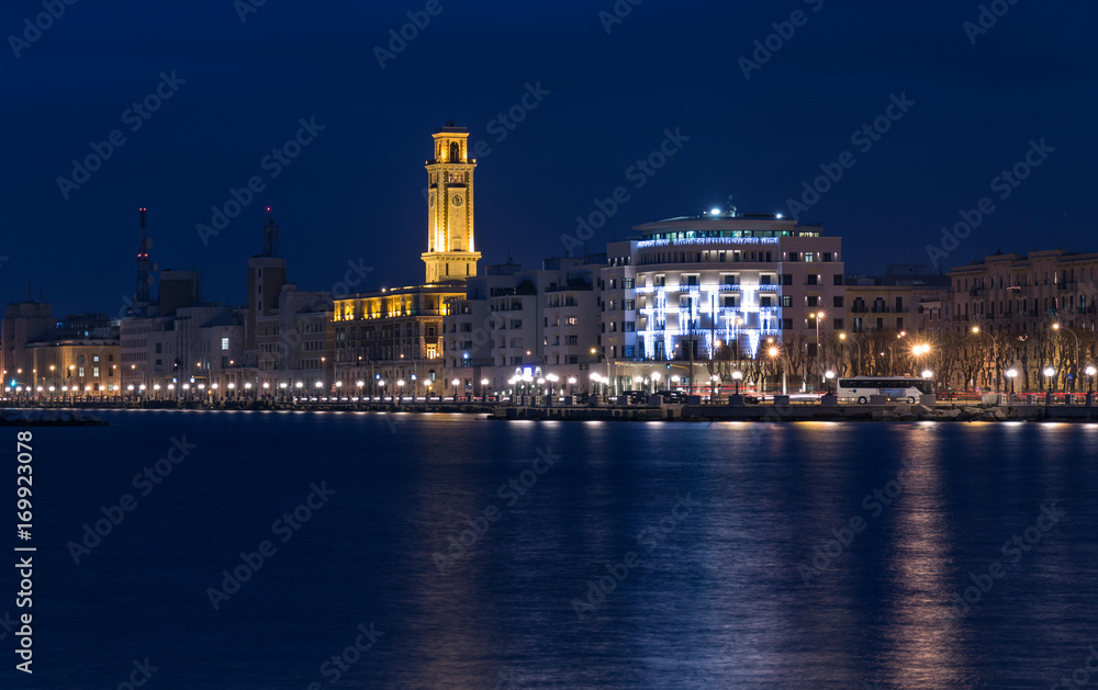 Bari seafront night Citylights cityscape. coastline at twilight