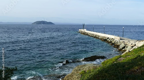 Pier in to the Mediterranean Sea at Neo Marmaras Greece photo