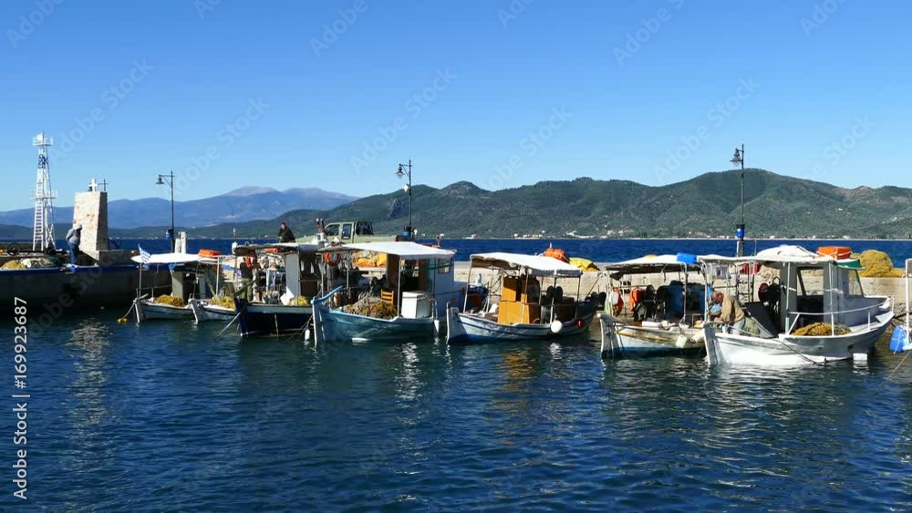 Fishing boats in the harbor of Loutra Greece Fishing boats in the harbor of Loutra Greece