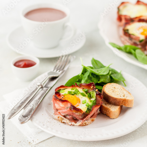 Fototapeta Naklejka Na Ścianę i Meble -  Bacon and Egg Cups with Spinach