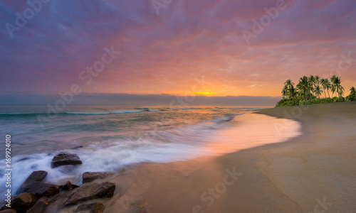 Fototapeta Naklejka Na Ścianę i Meble -  Tropical beach at sunset