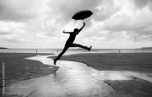 silly walks on a wet beach photo