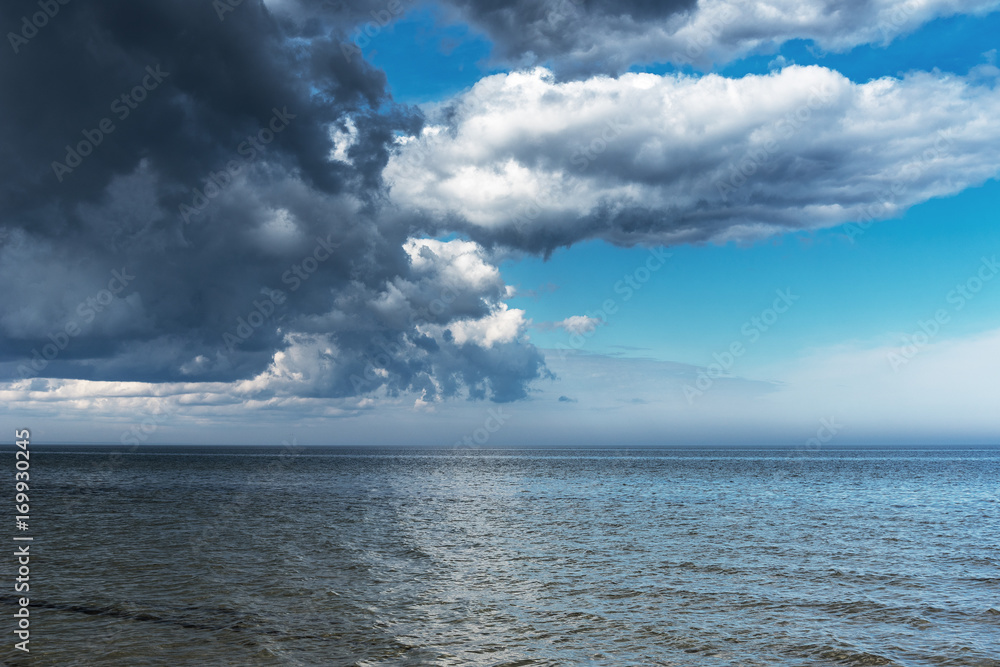 Obraz premium Stormy clouds above Baltic sea.