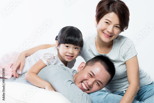 Young happy Asian family