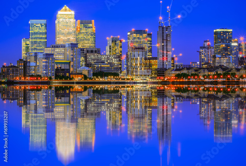 Illuminated cityscape in Canary Wharf, a major business district in east London