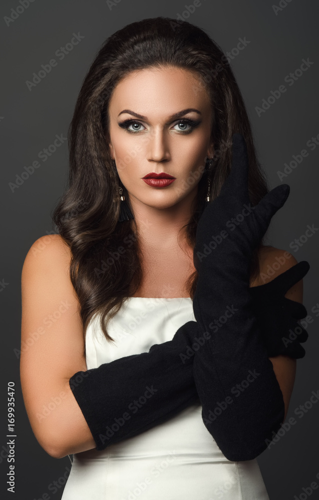 Fototapeta premium woman in black glove studio portrait