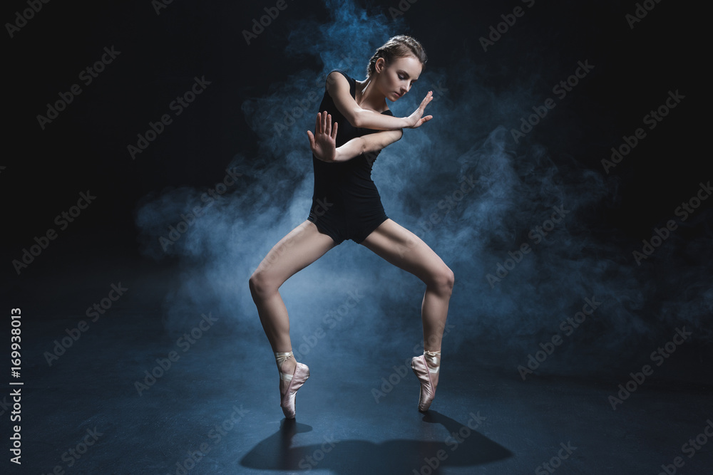 ballerina dancing in pointe and leotard