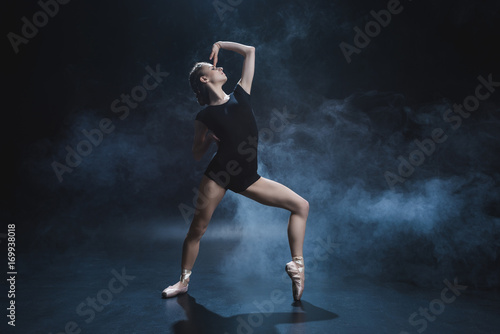 ballerina dancing in pointe and leotard