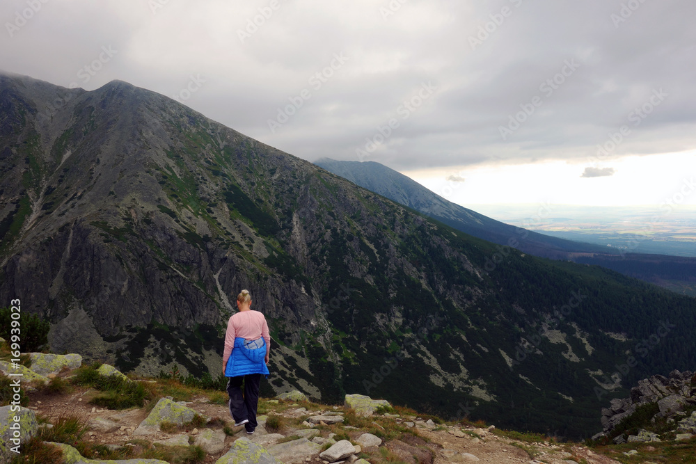 Tourist admiring High Tatras