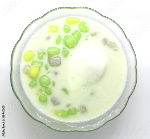 Sticky rice pearl wrapped in coconut milk with egg white in light syrup.