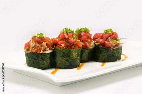 Wallpaper Mural Spicy Chutoro shushi, Spicy Chutoro rolls in white plate on white background Torontodigital.ca