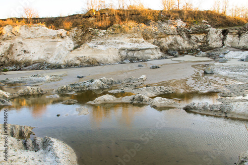 Sand pit with water in quarry