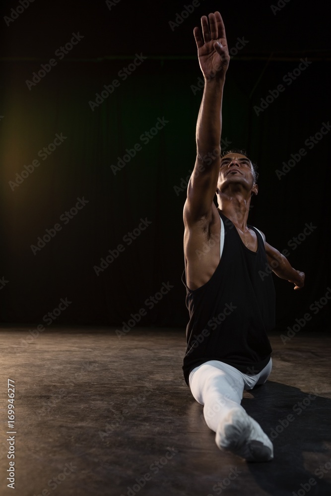 Ballet dancer performing a split Ballet dancer performing a split