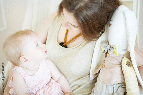 mom and daughter looking at each other