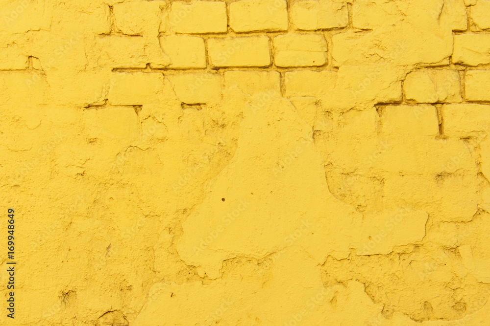 Obraz premium Texture of old yellow brick wall surface with cement and concrete seams