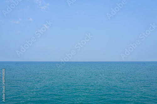 tropical sea and beach with blue sky background