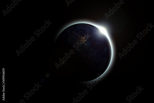 Fototapeta Naklejka Na Ścianę i Meble -  The earth covers the sun in a beautiful solar eclipse. The dark side of planet earth, Elements of this Image Furnished By NASA. Concept science, space, parallel universe.