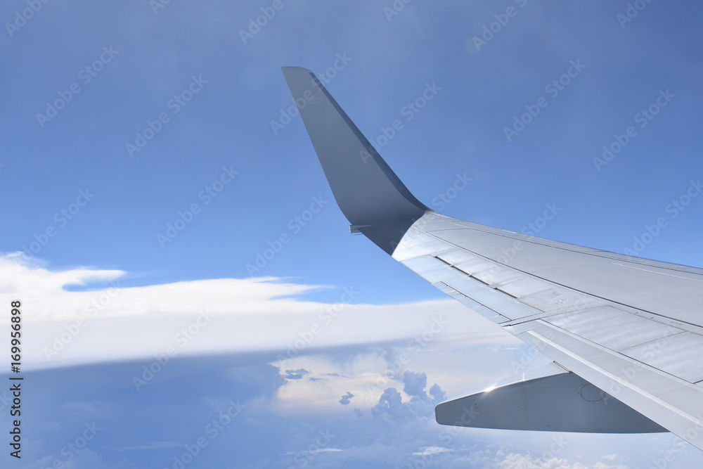 Airplane flying into the clouds Airplane flying into the clouds