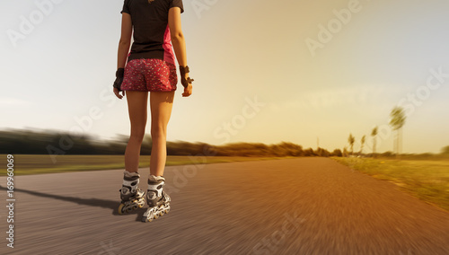 woman from behind skating in the street