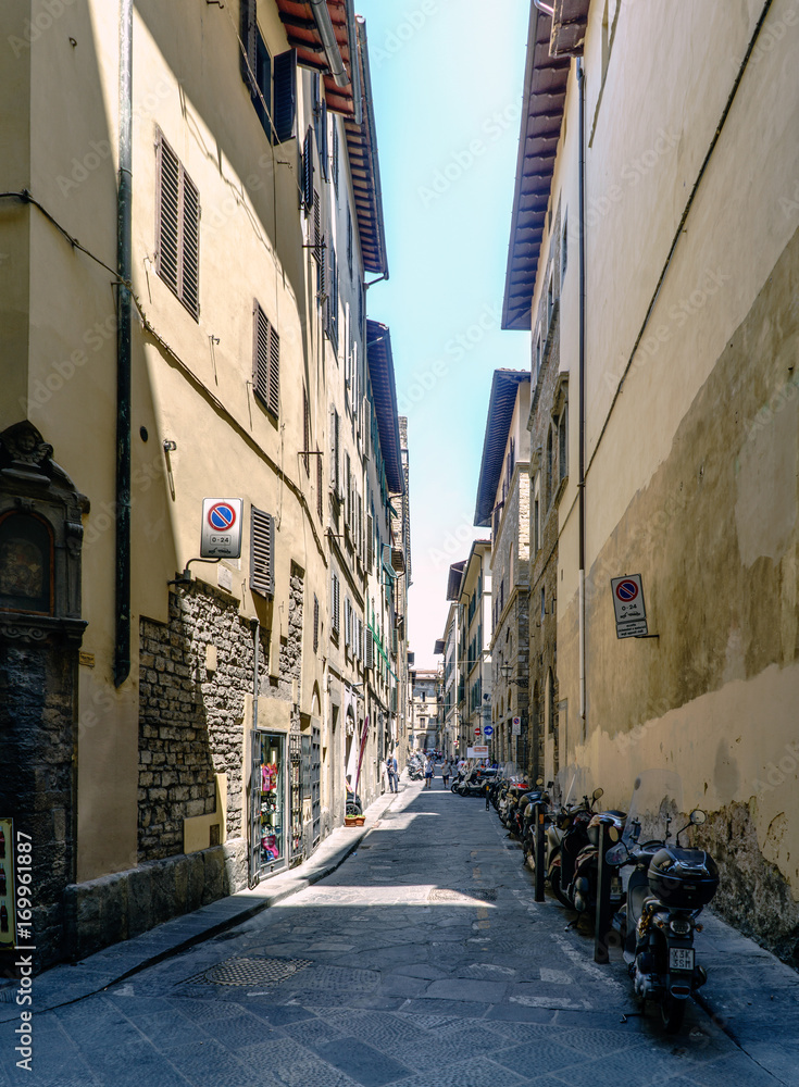 Florence, Tuscany, Italy. May 23, 2017: Narrow cobblestone street called 