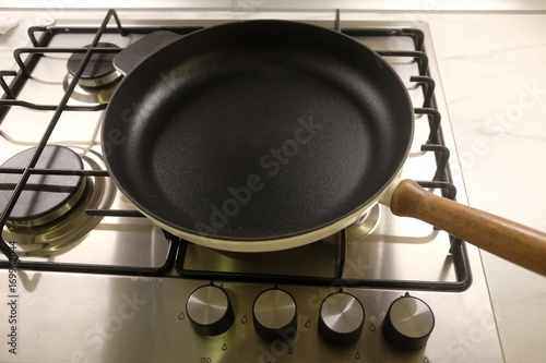 empty frying pan on the stove