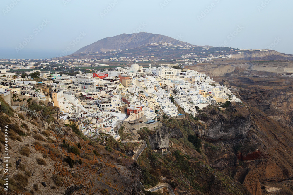 late afternoon in the whitewashed town of Fira on the island of Thira / Santorini, Greece