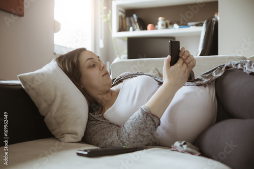Pregnant Woman Using A Smartphone
