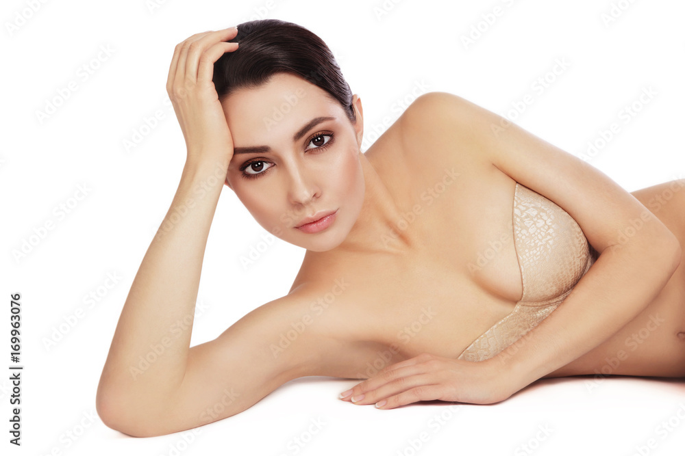 Young slim beautiful sexy woman in bra over white background, copy space Young slim beautiful sexy woman in bra over white background, copy space