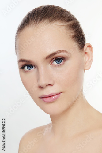 Portrait of young beautiful healthy girl with clean make-up, copy space