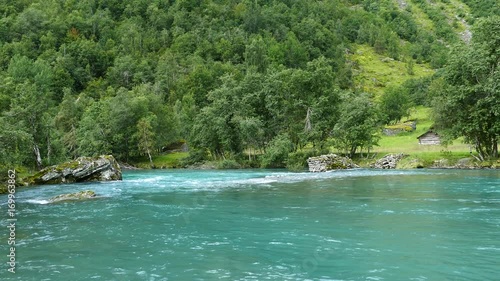 Clear blue water river and lake in Morkidsdalen park Skjolden Norway photo