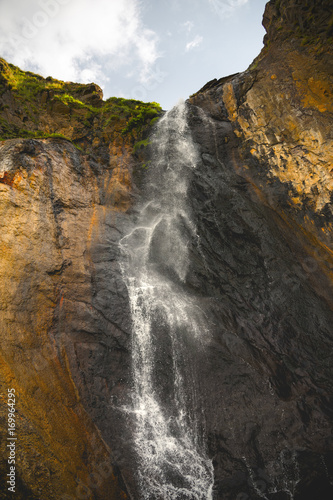 Caucasian waterfall high in the mountains