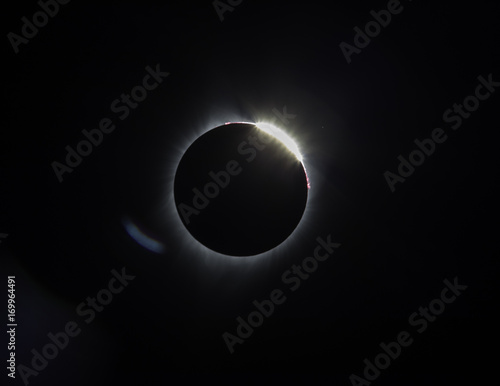 Diamond ring and red Prominence glowing in space