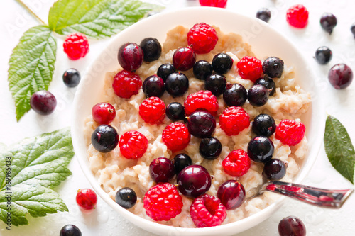 Oatmeal and forest berries close-up
