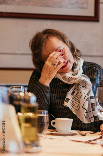 Senior Woman In A Restaurant