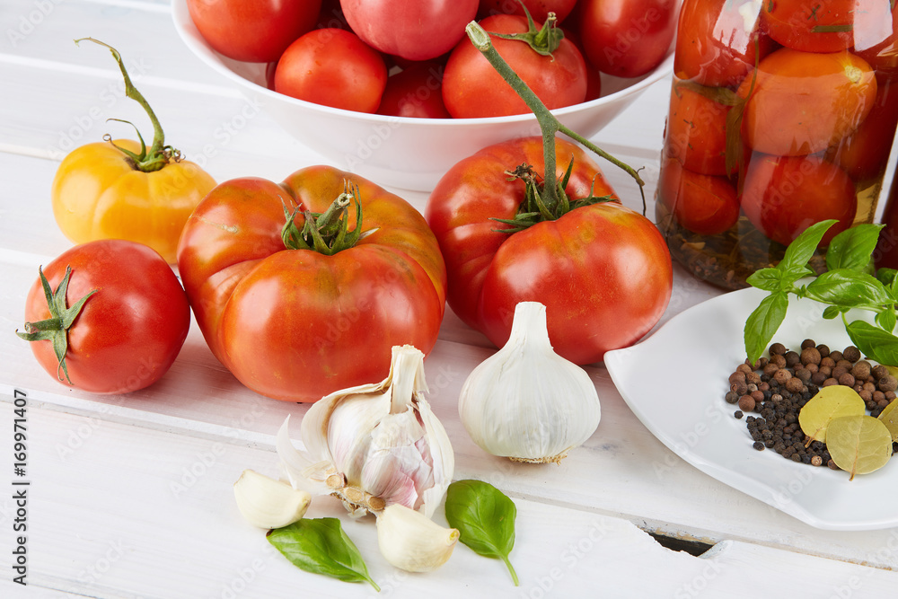 Tomatoes in jars from organic farming. Tomatoes in jars from organic farming.