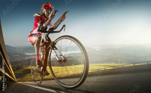 Fototapeta Naklejka Na Ścianę i Meble -  Sport background. Road cyclist. Crop.