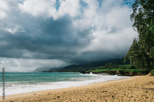 Storm clouds over beach in Hawaii